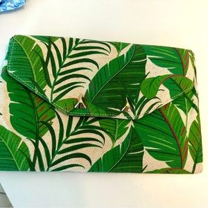 Super cute green palm leaves Stella and dot clutch